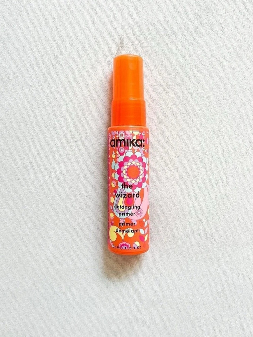 amika: the wizard detangling primer: